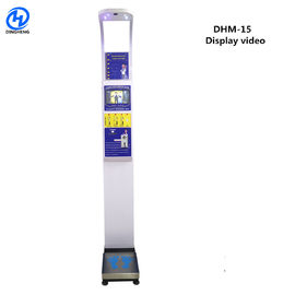 A escala da altura e do peso da escala do peso do gym DHM-15 indica o vídeo e o anúncio da escala da moeda BMI da medida do peso
